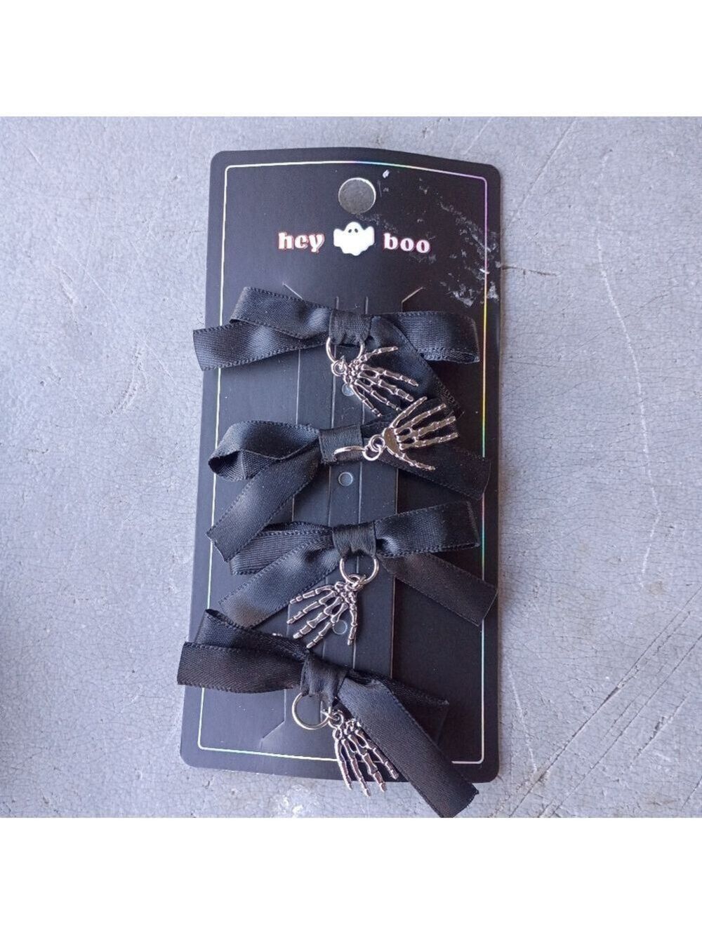2/$10  4 Piece Black Bow Set With Skeleton Hand Charms